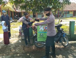 Bhabinkamtibmas Tertibkan Masyarakat Yang Tidak Menerapkan Prokes Covid-19