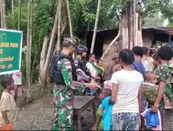 MENYAMBUT HUT YONIF 126/KC KE 60 TAHUN SATGAS PAMTAS YONIF 126/KC POS KALIMAO BAGIKAN PAKAIAN LAYAK PAKAI