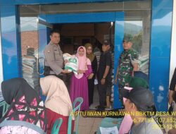 Aiptu Iwan Kurniawan melaksanakan Kegiatan Monitoring Pendistribusian Bantuan beras dari Badan Pangan Nasional (BPN) untuk Desa Wargaluyu Kecamatan Tanjungmedar