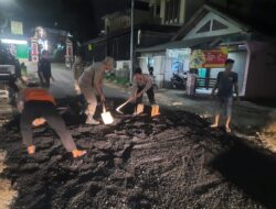 Dibawah Bintara pengawasan (Bawas) yang terampil Kanit Reskrim Aipda Ade Tatang dan anggota Inisiatif Tutupi Lubang di Jalan Genteng-Tanjungsari dengan Hotmix