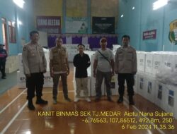 Aiptu Nana Sujana melaksnakan Kegiatan Pengamanan Logistik Pemilu 2024 di Gudang PPK Kecamatan Tanjungmedar Kabupaten Sumedang