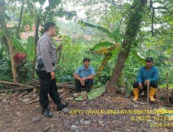 Aiptu Iwan Kurniawan Bhabinkamtibmas Polsek Tanjungmedar laksanakan giat sambang sampaikan pesan pesan kamtibmas