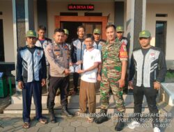 Bhabinkamtibmas Bersama babinsa Desa Tanjunghurip Hadiri Kegiatan Pembinaan Linmas