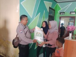 Kanit Binmas Polsek Tanjungkerta Hadiri Penyaluran Bantuan Pangan Cadangan Beras Pemerintah di Desa Cipanas