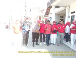 Bhabinkamtibmas Desa Mekarjaya Bripka Fariz Fahsya S.Sos. Monitoring Acara Puncak Memperingati Hari Kemerdekaan Republik Indonesia Ke – 79