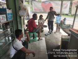 Aipda Tata Sasmita Bersama Bripka Agus Sukmana Laksanakan Sambang Kamtibmas dan Dumas Keliling di Tanjungmedar dalam Rangka BEYOND TRUST PRESISI