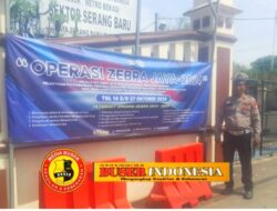 Meningkatkan Kesadaran Masyarakat, Polsek Serang Baru Pasang Sepanduk Bentuk Sosialisasi Pelaksanaan OPS Zebra Jaya 2024.