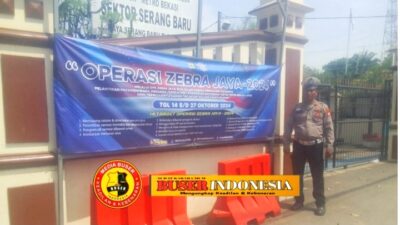 Meningkatkan Kesadaran Masyarakat, Polsek Serang Baru Pasang Sepanduk Bentuk Sosialisasi Pelaksanaan OPS Zebra Jaya 2024.