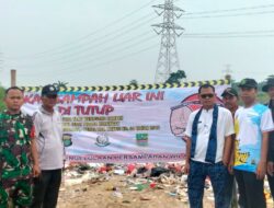 UPTD Pengelolaan Persampahan Wilayah I Pasang Plang larangan Membuang Sampah Secara liar di Tanggul Kali Cikarang Bekasi Laut : CBL