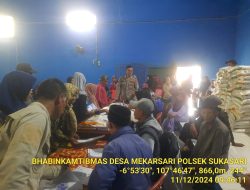 Polsek sukasari melaksanakan pengamanan penyerahan Bantuan Beras untuk Warga Desa meksrsari