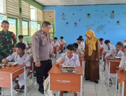 Bripka Fariz Fahsya Monitoring Program MBG ( Makan Bergizi Gratis) Untuk Siswa/Siswi SMPN 8 Sumedang