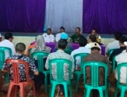 Bhabinkamtibmas Desa Sukamukti Hadiri Rapat RT/RW di GOR Desa Sukamukti