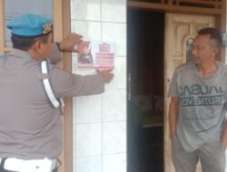 Anggota Polsek Tanjungmedar Sosialisasikan Layanan Kepolisian 110 Bebas Pulsa kepada Warga