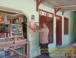 Anggota Polsek Tanjungmedar Sosialisasikan Layanan Kepolisian 110 Bebas Pulsa kepada Warga