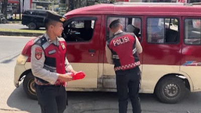 Polda Sumsel Tebar Bendera Merah Putih, Tumbuhkan Semangat Nasionalisme Jelang HUT RI