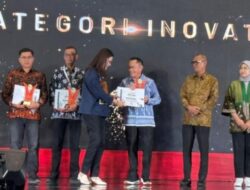 Tanah Bumbu Terima Penghargaan Stand Kategori Inovatif di AOE 2025